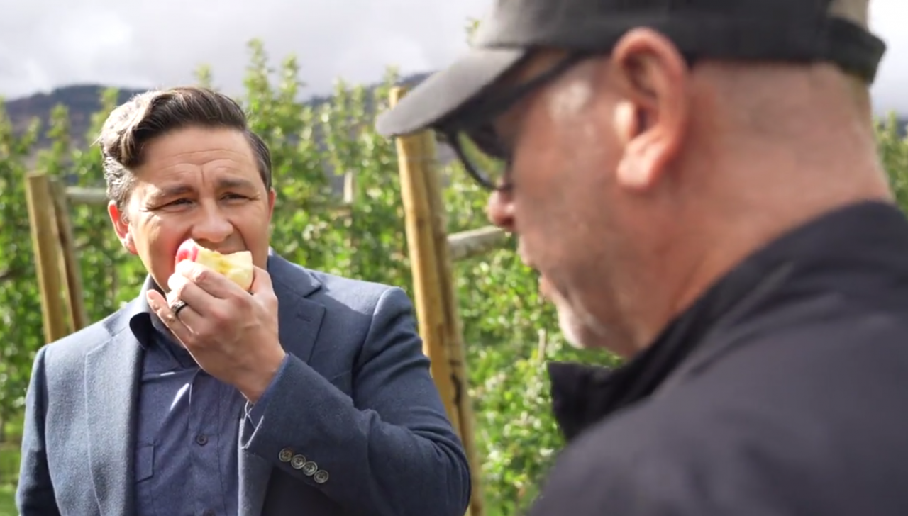 Canadian politician interviewed while eating an apple